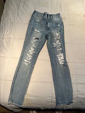 American Eagle Outfitters Light Blue Ripped Super High Rise Jeggings
